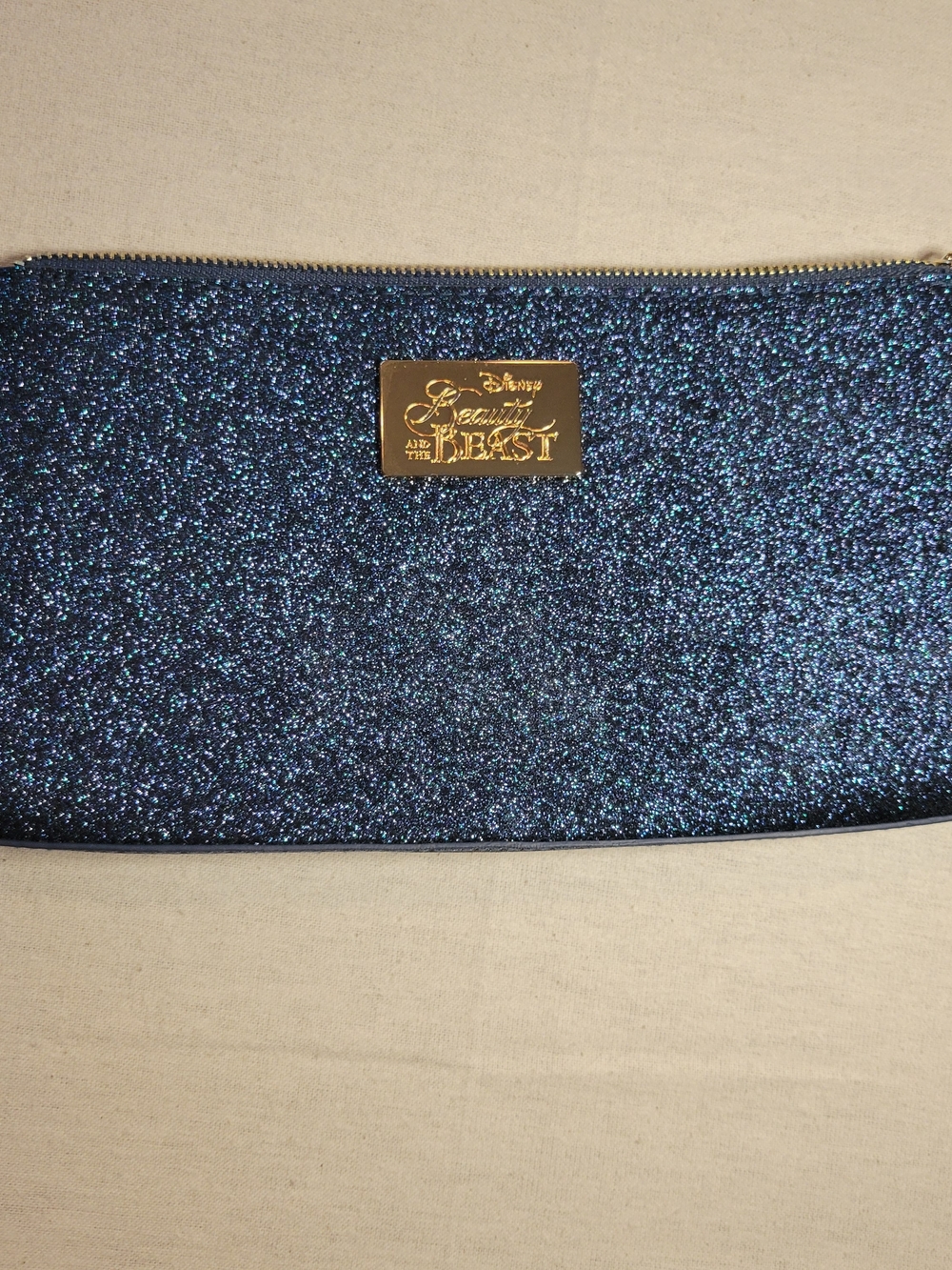 Disney Beauty and the Beast Sparkling Navy Blue Wristlet with Gold Plaque